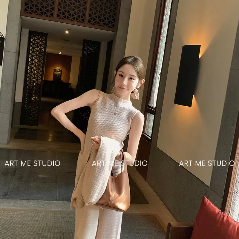 ARTME瓜瓜天鹅颈莱赛尔山羊绒细织高密坑条修身三色上衣w26079